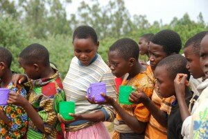 Children at Canzikiro school in Karuzi Province wait in line for school MDA