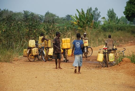 boys collecting water in Citoboke, along the Congo Border